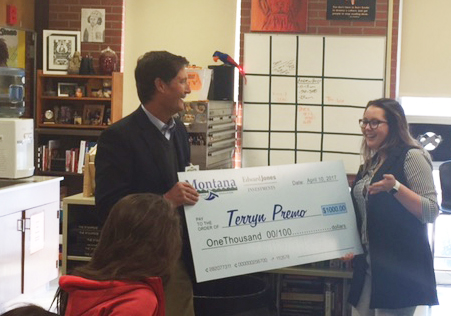 MNA Executive Director Jim Rickman presents Terryn Premo with a $1,000 scholarship.